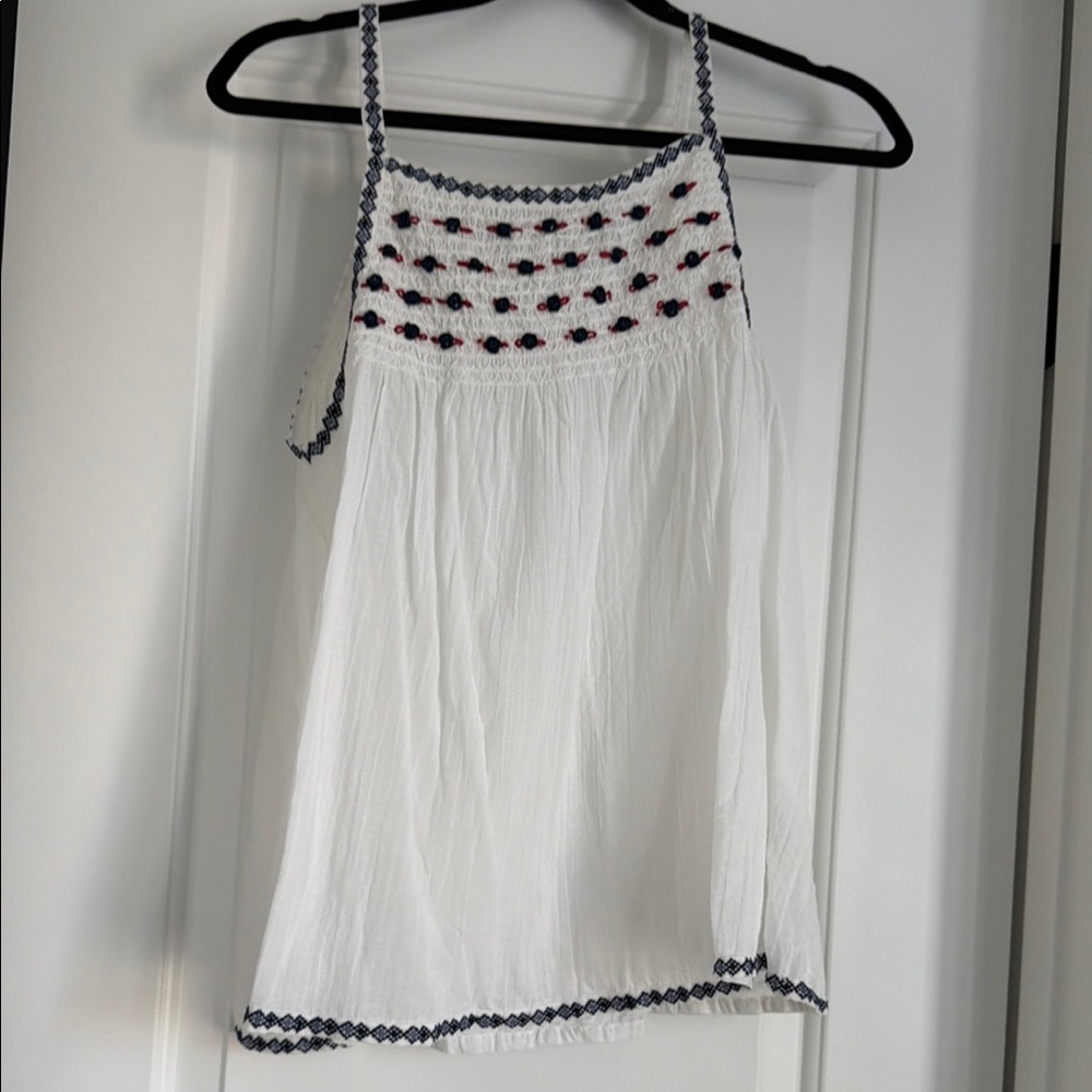 White Sleeveless Top with Embroidered Details